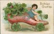Cherub Riding Shoe Car, 4 Leaf Clovers, Early 1900's Emboosed Birthday Postcard
