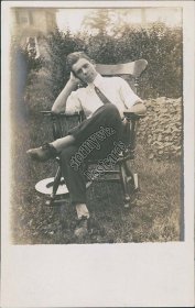 Young Man Sitting on Rocking Chair - Early 1900's Real Photo RP Postcard