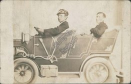 2 Men Posing in Mock-Up Car Automobile, Detroit Toledo RP Studio Photo Postcard